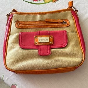 Crossbody cream with hot pink, orange & woven